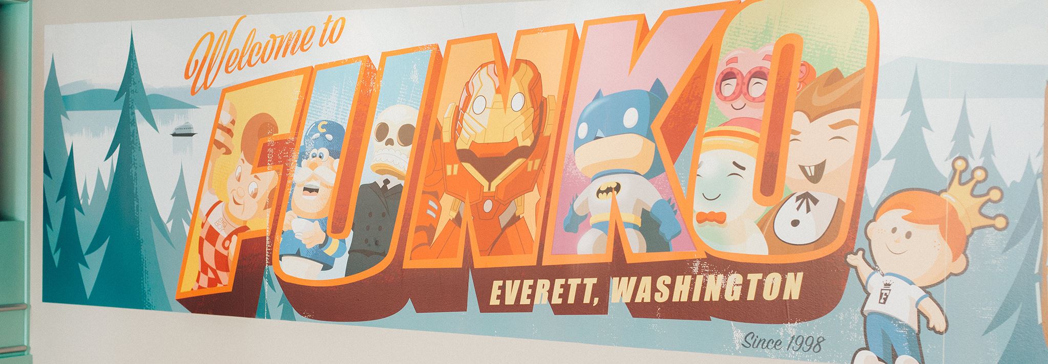 A postcard-like wall painting says 'Funko'